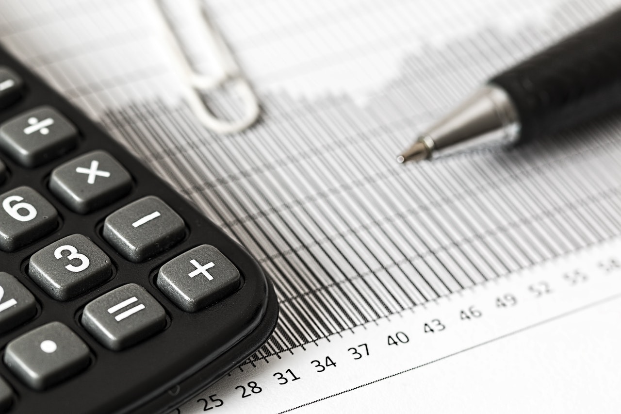 Financial data and a calculator representing mandatory financial disclosure between parents